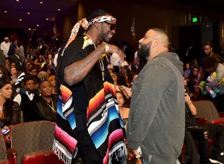 Ain't Seen Each Other in a Minute - 2 Chainz reaches out to give dap to the homey DJ Khaled.(Photo: Paras Griffin/BET/Getty Images for BET Networks)