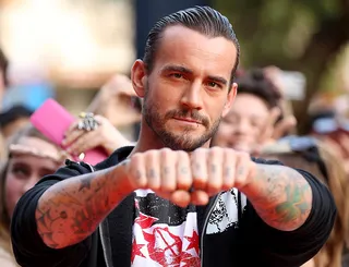 CM Punk (@CMPunk) - TWEET: "I would like @chrisbrown fight somebody that can defend themselves. Me curb stomping that turd would be a #wrestlemania moment."&nbsp;WWE wrestler CM Punk sparks a Twitter feud with Breezy.&nbsp;(Photo: Mark Metcalfe/Getty Images)