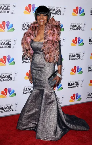 Cicely Tyson   - The on-screen legend went for the full-on “Diva effect” and added a rose-colored feather boa to her mermaid dress.  (Photo: Scott Kirkland/PictureGroup)