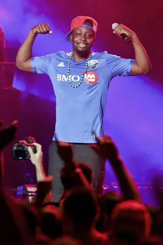 Flexin' - Haitian rapper Wyclef Jean kicks off the Just 4 Laughs festival in Montreal with a free outdoor concert performance.(Photo: Splash News)