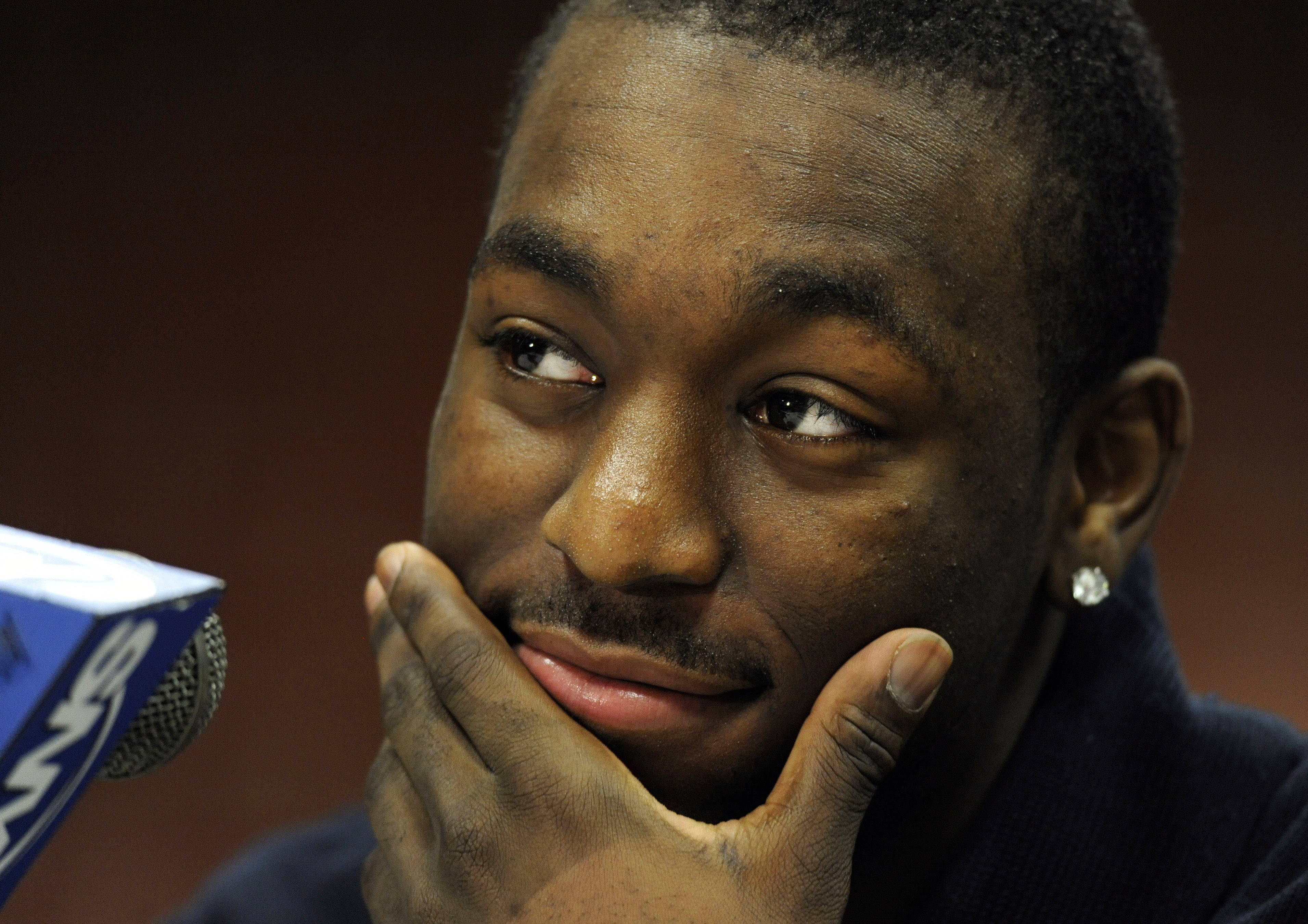 UConn Star Admits Reading First Book at Age 20 - In a recent Sports Illustrated interview Kemba Walker, who led his University of Connecticut Huskies to a National Championship this year, revealed that he read his first book, Forty Million Dollar Slaves: The Rise, Fall and Redemption of the Black Athlete, last year. “That’s true,” he said. “You can write that. It is the first book I’ve ever read.” Another factoid to raise eyebrows: Walker is due to graduate next month, a year early. His team got the flack from Education Secretary Arne Duncan this year for only graduating 25 percent of its Black players. (Photo: AP Photo/Jessica Hill)