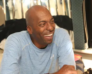 All Smiles - John Salley smiled from ear to ear while enjoying the bus ride to Selma.(Photo: Johnny Nunez/BET)