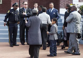 Jesse Jackson - Jesse Jackson and several others arrive at a special church service at Brown Chapel AME on Sunday.&nbsp;(Photo: Ty Wright/BET)