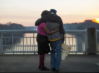 Touching Moment - People gather on the Edmund Pettus Bridge after President Obama's speech. (Photo: Ty Wright for BET)