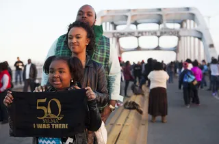 Witnessing History - A family poses as they commemorate the 50th anniversary of the marches that ultimately led to securing access to the polls.&nbsp;(Photo: Ty Wright for BET)