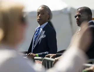 The Reverend - Reverend Al Sharpton examines the crowd as he listens to the speakers. (Photo: Ty Wright for BET)