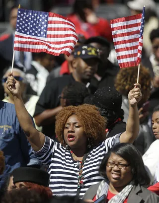 America the Beautiful&nbsp; - Patriotism was strong in Selma as onlookers showed their solidarity during the president's speech.&nbsp;(Photo: AP Photo/Gerald Herbert)