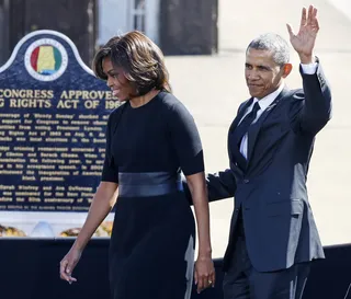 Presidential Greetings - The president and the first lady greet the citizens of Selma. (Photo: EPA/ERIK LESSER /LANDOV)