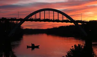 A Gorgeous Sight - The sun set beautifully over the historic Edmund Pettus Bridge just hours before the 50th anniversary of the civil rights march.(Photo: AP Photo/Butch Dill)