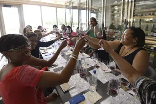 Cheers! - An afternoon of wine tasting put everyone in good spirits.(Photo: Gustavo Caballero/Getty Images)