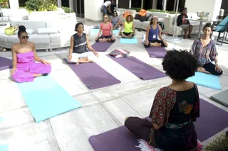 Gentle Flow - Pearce took the class through a series of gentle stretches and breathing exercises to leave them feeling energized and balanced.&nbsp;  (Photo: Gustavo Caballero/Getty Images)