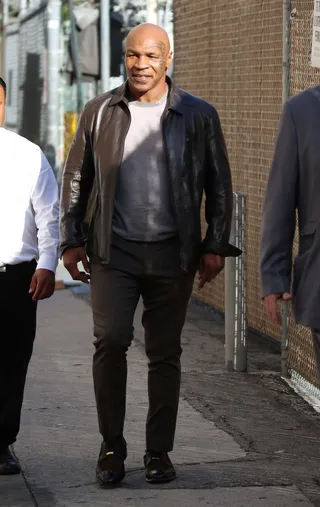 Dapper Mike - Mike Tyson looks stylish in a leather jacket and crew neck sweater for a taping of Jimmy Kimmel Live in Hollywood.(Photo: Sonia Hall / Splash News)