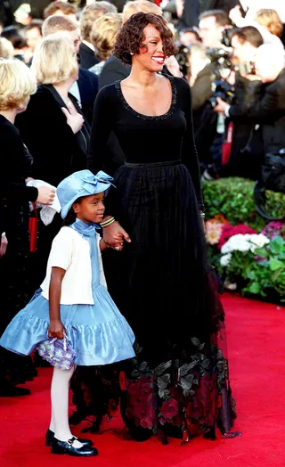 The Bodyguard - Whitney Houston walked the red carpet with her little angel at the 71st academy Awards in 1999.&nbsp;(Photo: Peter Jordan/PA Photos/Landov)
