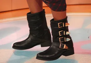 Biker Chic - Angela Simmons rocks gold and black biker boots on 106. (Photo: Bennett Raglin/BET/Getty Images for BET)