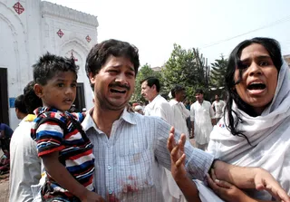 Christian Churchgoers Targeted - Free meals of rice were reportedly being served on the front lawn of the church prior to the bombing. More than 140 people were injured.(Photo: AP Photo/Mohammad Sajjad)