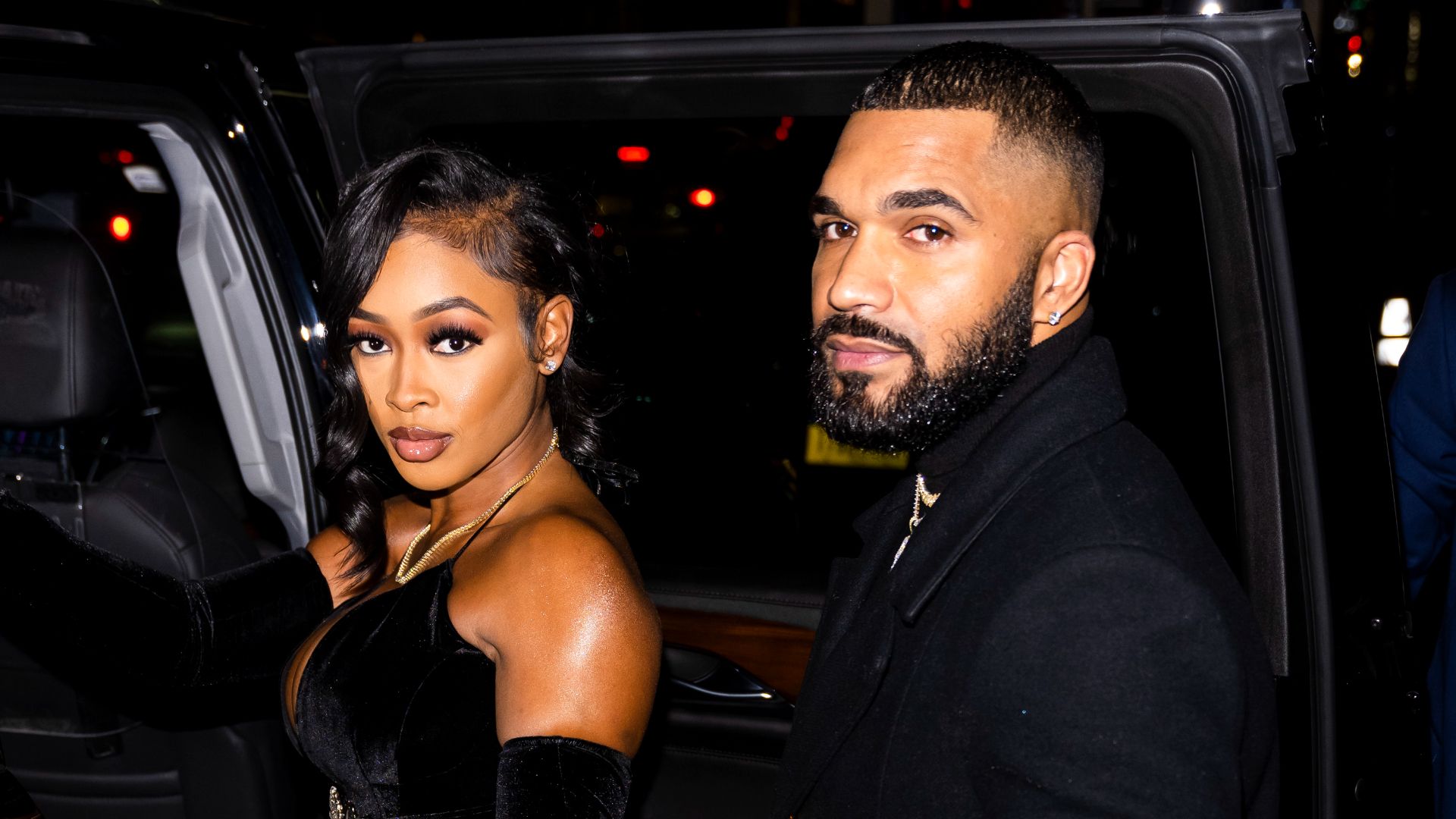 Miracle Watts and Tyler Lepley are seen in Midtown on December 01, 2021 in New York City. 