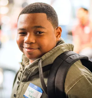 RonReaco Loves the Kids - RonReaco manages to capture a smooth style from one of the child actors on set for Let's Stay Together. RonReaco is for the children. (Photo: RonReacos/BET)