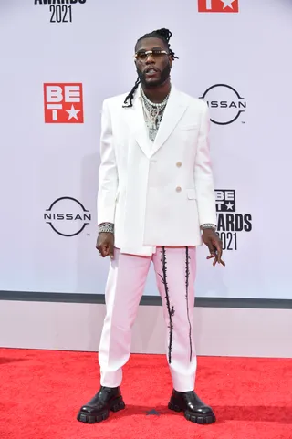 2021: Burna Boy - (Photo by Aaron J. Thornton/Getty Images)