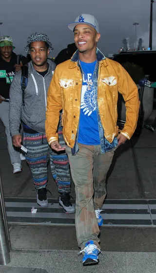 Welcome to New York - Rapper T.I. is one happy camper as he arrives at NY's John F. Kennedy (JFK) Airport.&nbsp;(Photo: JD/WENN.com)