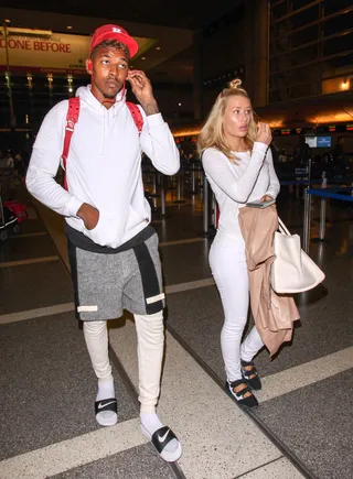 Guess Who's Coming to Dinner - Newly engaged Iggy Azalea and fiancé Nick Young head inside LAX Airport in Los Angeles en route to Iggy's native country of Australia.(Photo: INFphoto.com)