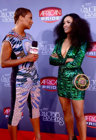 Texture Talk - We wonder what these two superstars are dishing about. We hope it’s about the style rundown for Kat’s fierce mane. Want!  (Photo: Bryan Steffy/BET/Getty Images)