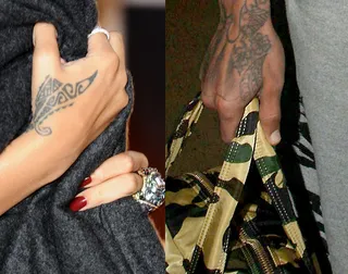 Shared Tattoo - Rihanna and Chris Brown share the same henna-style tattoo pattern on their hands. (Photos from left: Ian Gavan/Getty Images,FameFlynet)