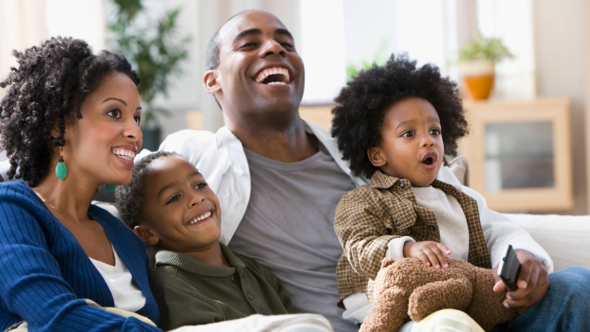 Family watching television together 