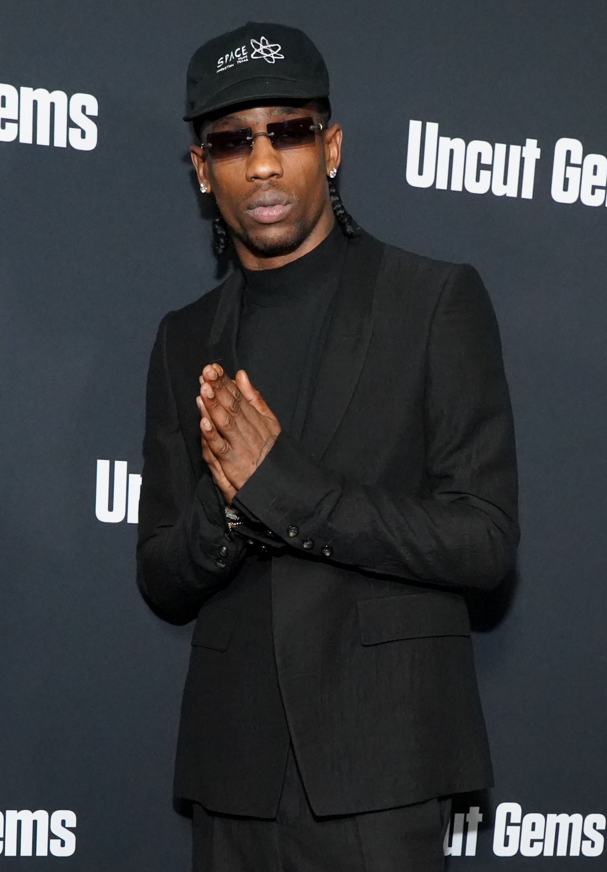 HOLLYWOOD, CALIFORNIA - DECEMBER 11: Travis Scott attends the premiere of A24's "Uncut Gems" at The Dome at Arclight Hollywood on December 11, 2019 in Hollywood, California. (Photo by Rachel Luna/WireImage)