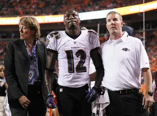 Jacoby Jones Sprains Knee - Baltimore Ravens wide receiver Jacoby Jones sprained his right knee at the season opener Sept. 5 against the Denver Broncos. Jones was injured in the second quarter when teammate Brynden Trawick ran into him at the Baltimore 15 yard line. Baltimore says Jones may be out for the season.(Photo: Doug Pensinger/Getty Images)