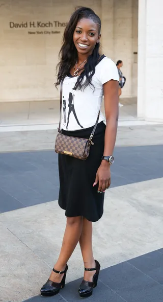 Modern Wonder - Who says simple is boring? We love how fashion stylist NephyLA Mode’s casual Zara top serves as a modern update to her classic Michael Kors skirt.   (Photo: Chelsea Lauren/Getty Images)