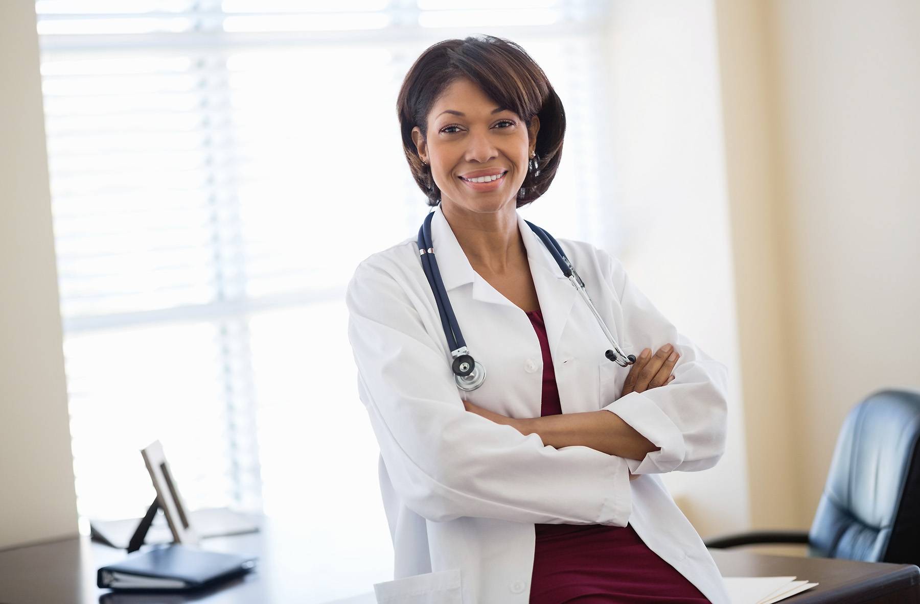 female doctor in her office