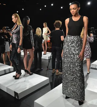 David Tlale Spring 2014 - Models light up the runway in sparkling separates. And look who we spotted... It’s Devyn — winner of The Face!  (Photo: Slaven Vlasic/Getty Images for Mercedes-Benz Fashion Week)