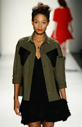 Go With Green - Pick up the right green for you. From emerald to forest, the shade isn’t going anywhere, so hop on the fashion bandwagon if you haven’t already. It will show up in everything from fabrics to jewelry to shoes.  Bonus Tip: Don’t bail on military green. It’s a trend that just won’t die.  (Photo by Frazer Harrison/Getty Images for Mercedes-Benz Fashion Week)