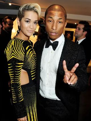 Future Sound - Rita Ora&nbsp;and Pharrell Williams make for a striking pair at the GQ Men of the Year awards at The Royal Opera House in London. (Photo: David M. Benett/Getty Images)