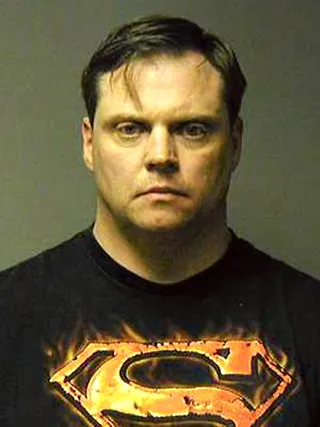 Ohio White Supremacist Arrested - FBI agents discovered four trailers filled with Neo-Nazi paraphernalia and weapons in Richard Schmidt’s possession when they arrested him on charges of marketing counterfeit goods from China. Schmidt was prohibited from purchasing firearms after serving 13 years in jail for killing a Latino man and shooting two others in 1989.&nbsp;(Photo: FBI)