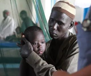 Tongue Spray for Tots - An Australian pharmaceutical company announced that it is close to rolling out an under-tongue spray that they claim is more effective than intravenous quinine (the traditional treatment) in treating children with malaria.  &nbsp;(Photo: REUTERS/Margaret Aguirre/International Medical Corps/Handout)