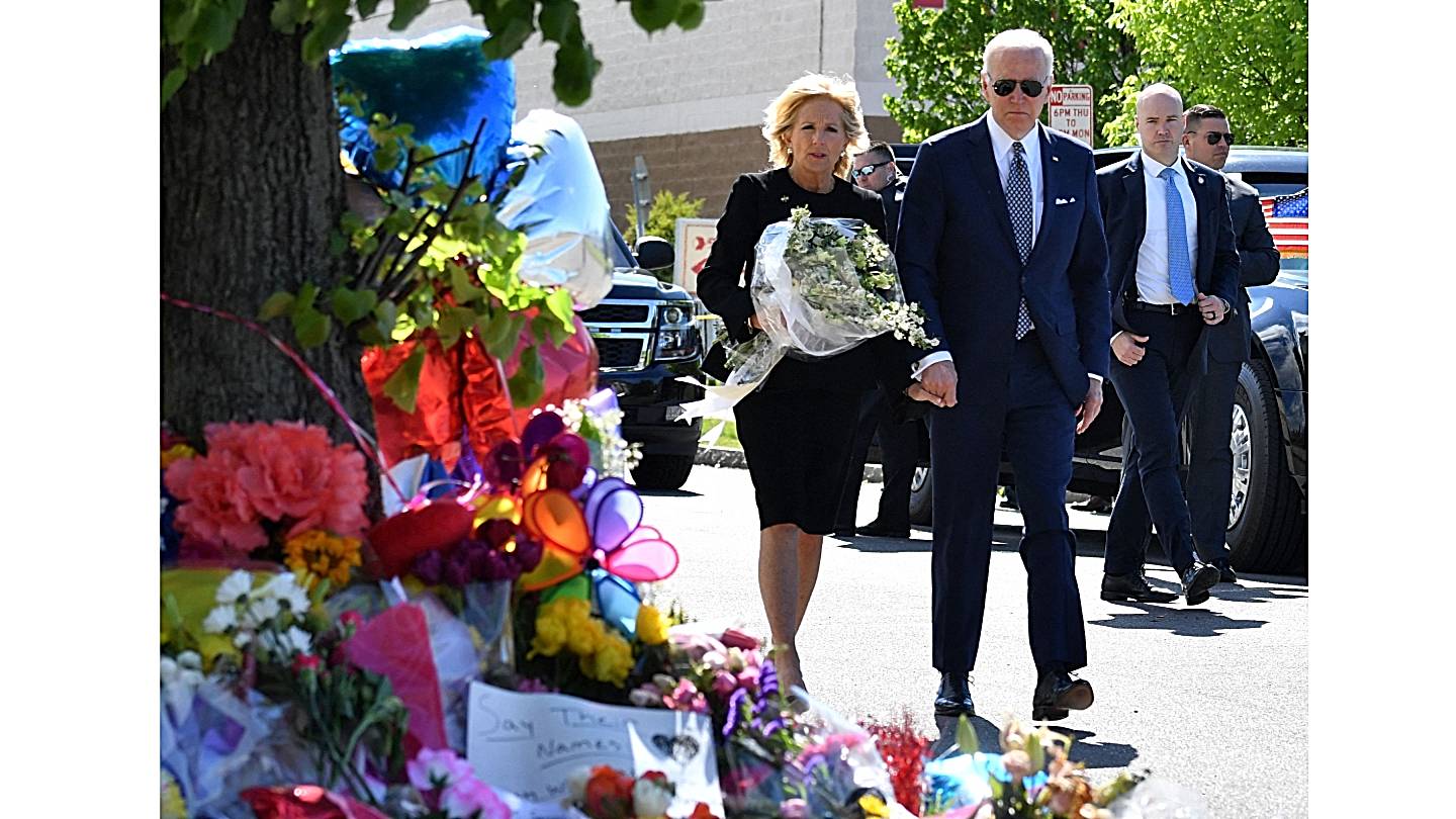 President Joe Biden and US First Lady Jill Biden visit a memorial near a Tops grocery store in Buffalo, New York, on May 17, 2022.  