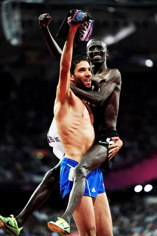 Congratulations! - Silver medalist Mahiedine Mekhissi-Benabbad of France celebrates with gold medalist Ezekiel Kemboi of Kenya after completing the men's 3000m steeplechase.(Photo: Stu Forster/Getty Images)