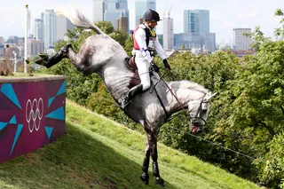 Getting a Jump on the Competition - Marc Rigouts of Belgium and horse Dunkas complete a jump in the cross country event.&nbsp;(Photo: Alex Livesey/Getty Images)