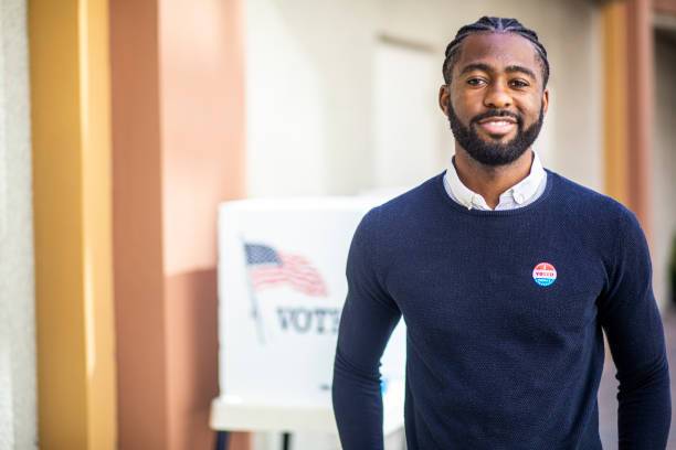 Guy standing near voting site