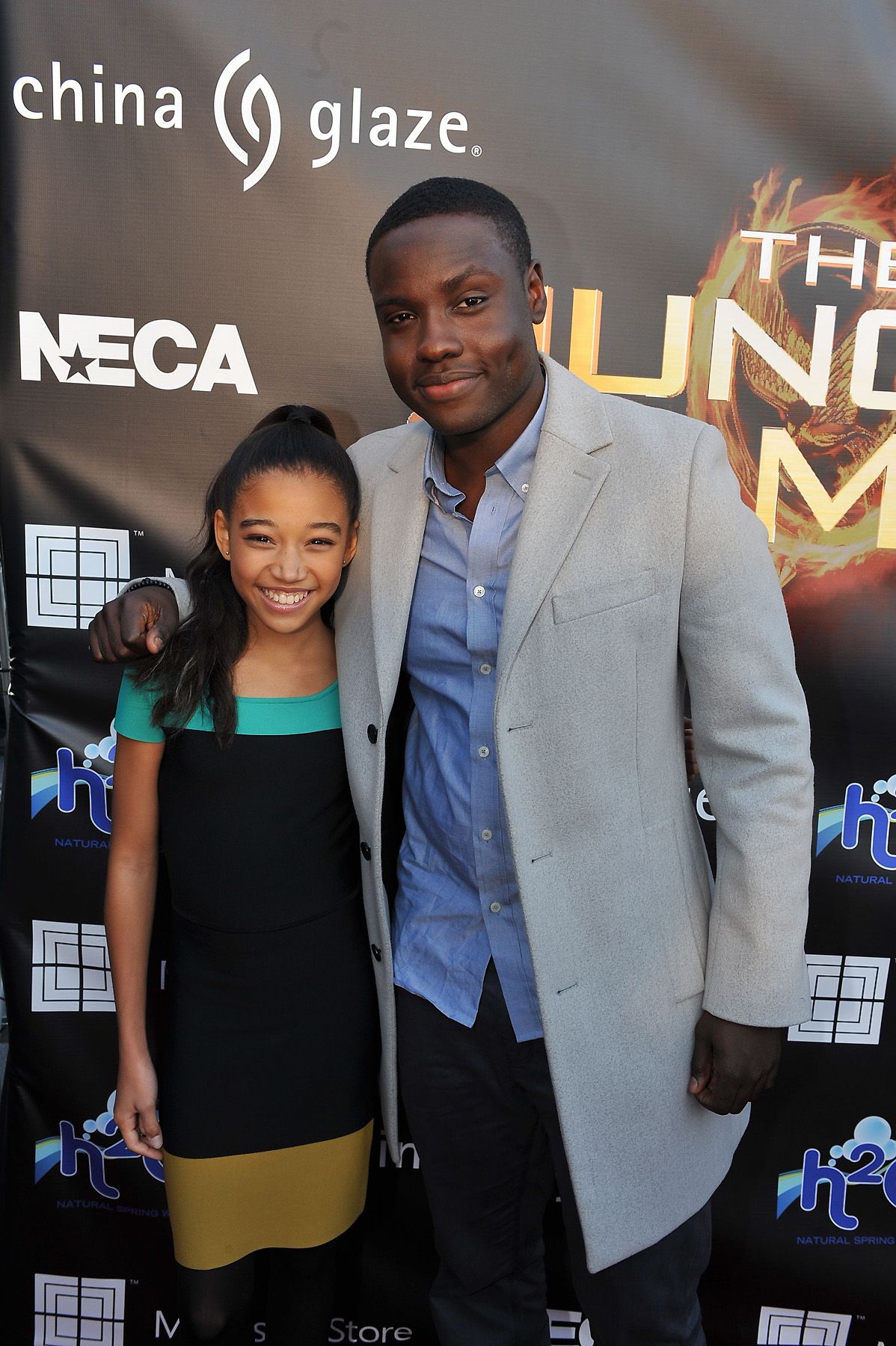 Amandla Stenberg and actor Dayo Okeniyi in The Hunger Games\r - For these two unknown actors, landing the roles of District 11 members Rue and Thresh, respectively, was better than winning the jackpot. As Entertainment Weekly predicted last year, "the industry will watch two stars born right before their eyes." Now that THG has far surpassed even the greatest expectations, we'll have our eyes peeled for what these two young stars do next. &nbsp; (Photo: Moses Robinson/Getty Images)