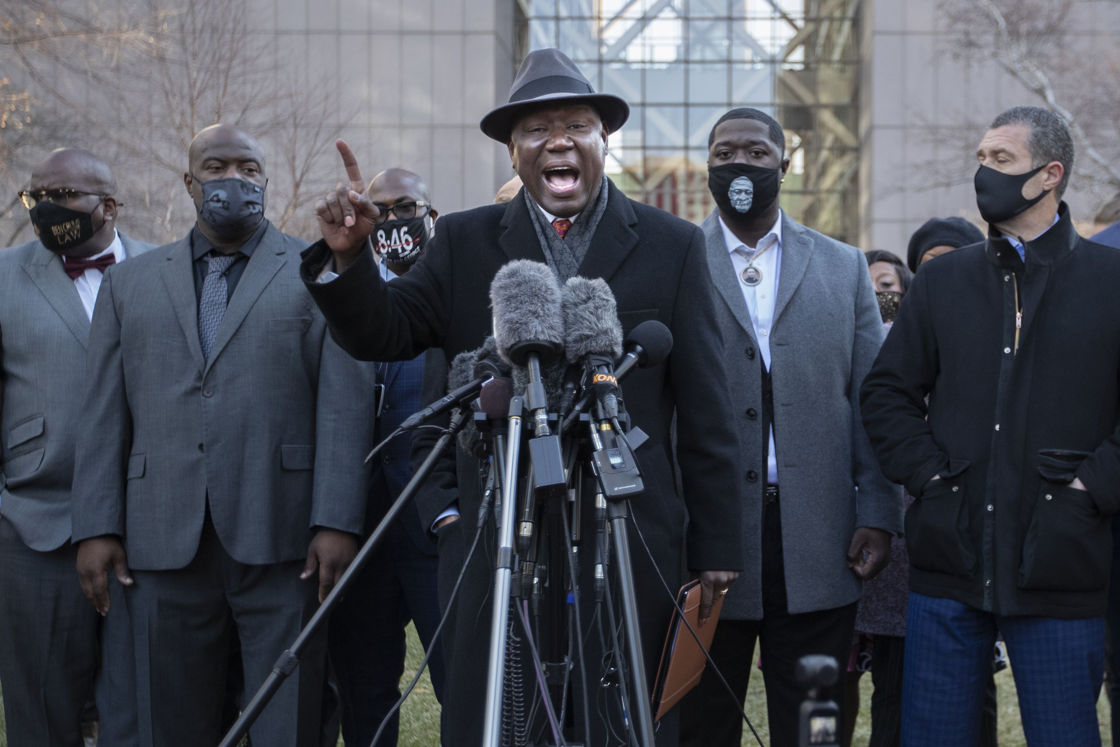 MINNEAPOLIS, MINNESOTA, USA - MARCH 29: Attorney Benjamin Crump (C) speaks during a morning press conference in front of the Hennepin County Government Center at the start of the trial of former officer Derek Chauvin over the killing of George Floyd in Minneapolis, United States on March 29, 2021. (Photo by Christopher Mark Juhn/Anadolu Agency via Getty Images)