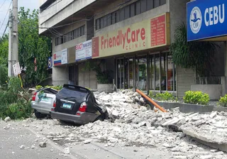 Earthquake Kills Dozens in Philippines - The Muslim festival of Eid al-Adha was grim for Filipinos as another natural disaster tore the central Philippines apart. More than 60 people died and about 160 were injured Tuesday when a 7.1 magnitude earthquake struck central Philippines near the Cebu province. (Photo: AP Photo/Chester Baldicantos)