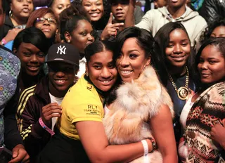 Rebellious Love - Recording artist K. Michelle has a moment with a fan. (Photo: Bennett Raglin/BET/Getty Images for BET)