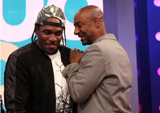 Inside Jokes - Recording artist Pusha T and Stephen Hill of BET share a little inside joke while on set. (Photo: Bennett Raglin/BET/Getty Images for BET)
