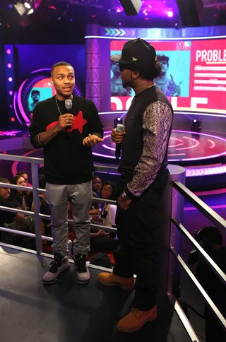 Oh! - Host Bow Wow and recording artist Problem having a candid laugh on the set of 106. (Photo: Bennett Raglin/BET/Getty Images for BET)