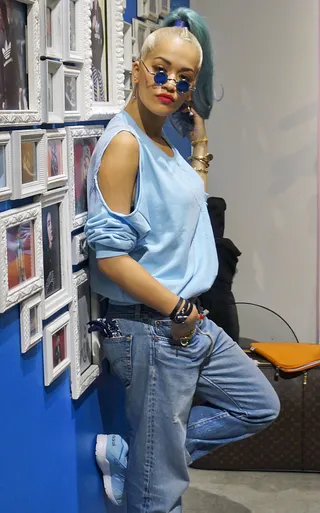 When in...Japan - British singer Rita Ora adopts the street trends of Japan while in Tokyo meeting fans at an Adidas store rocking baby blue from head to toe.(Photo: R Chiang / Splash News)