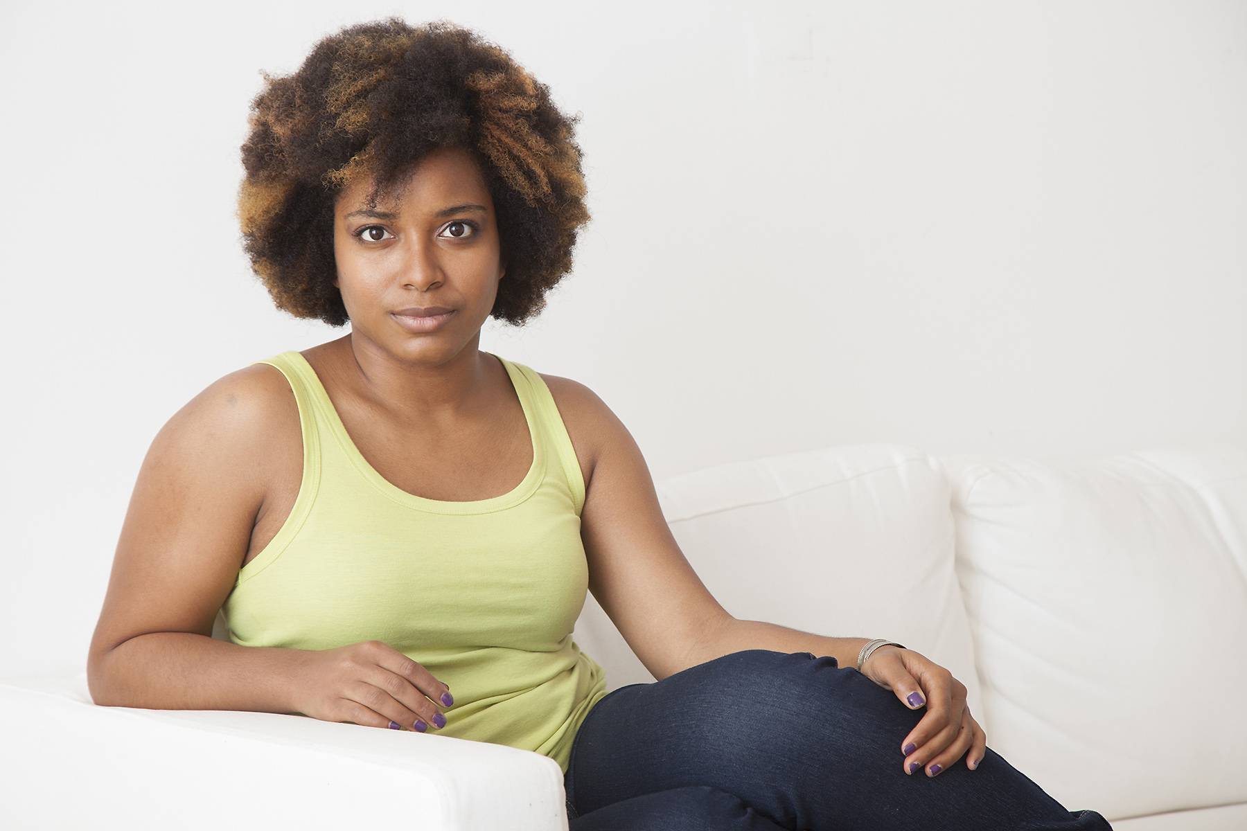 woman sitting on the couch