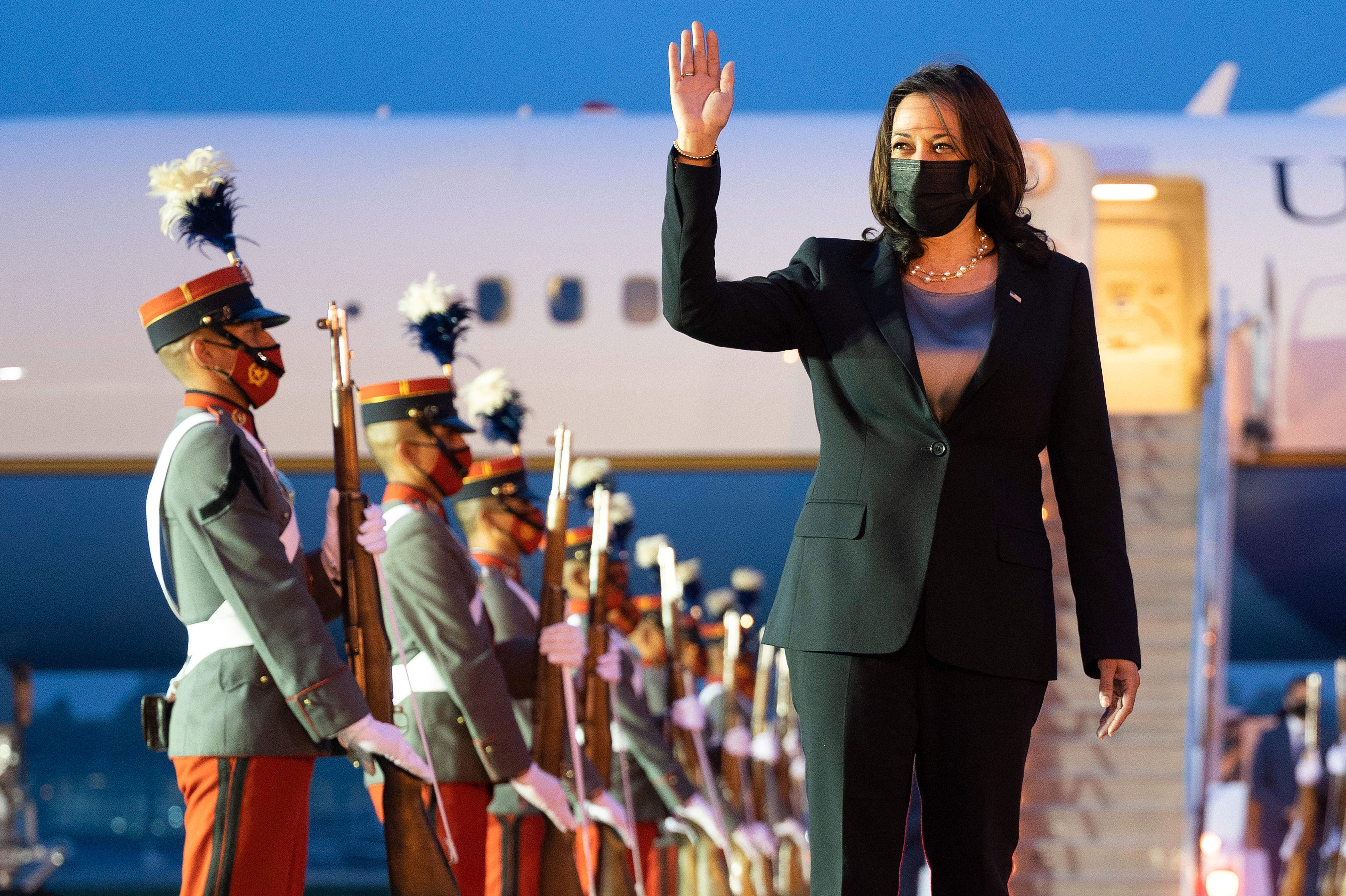 US Vice President Kamala Harris waves upon arrival at the Aeropuerto Internacional La Aurora in Guatemala City on June 6, 2021. - US Vice President Kamala Harris will visit Guatemala and Mexico this week, bringing a message of hope to a region hammered by Covid-19 and which is the source of most of the undocumented migrants seeking entry to the US. (Photo by JIM WATSON / AFP) (Photo by JIM WATSON/AFP via Getty Images)