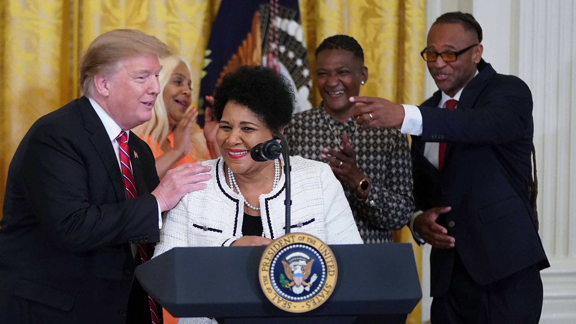 Alice Marie Johnson and Donald Trump on BET Buzz 2020.